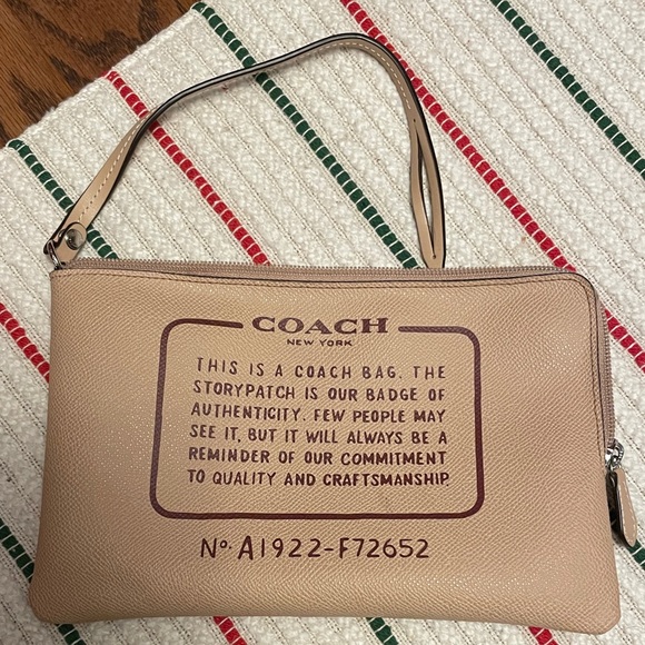 Coach Handbags - Coach Beige Leather Pouch